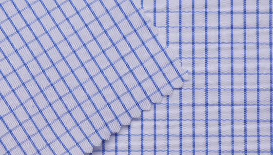 Blue windowpane check 100% cotton shirting fabric.